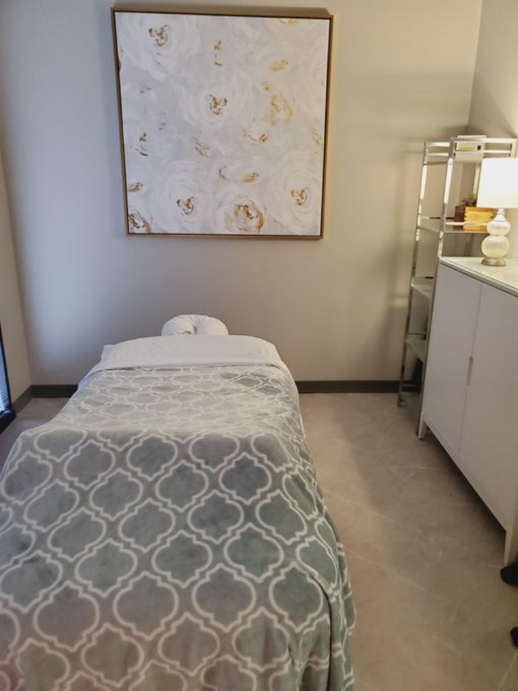 Soft indoor session room with white-rose painting and gray linens