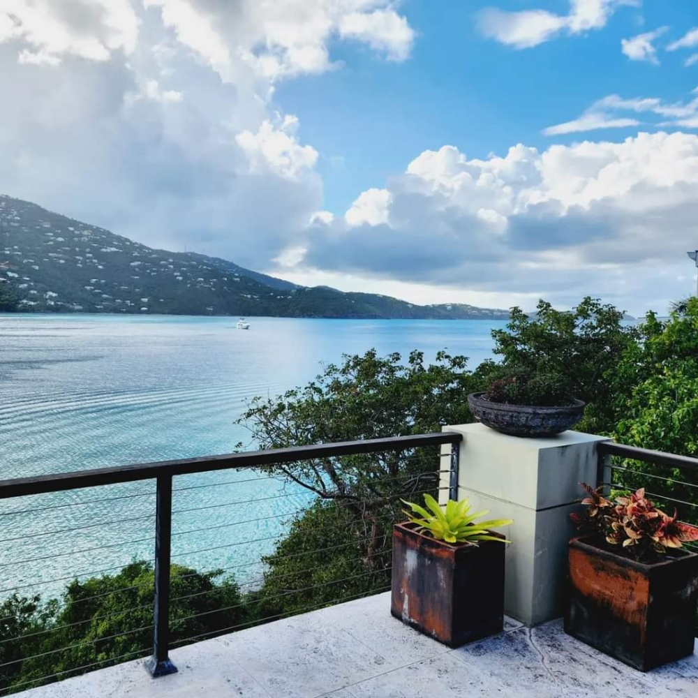 Terrace view over a St. Thomas bay with tropical planters